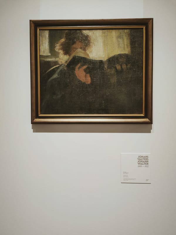 foto de la pintura al óleo de Johann Walter titulada 'by the window' en la que se ve una persona leyendo un libro que le cubre prácticamente toda la cara excepto los ojos y la frente